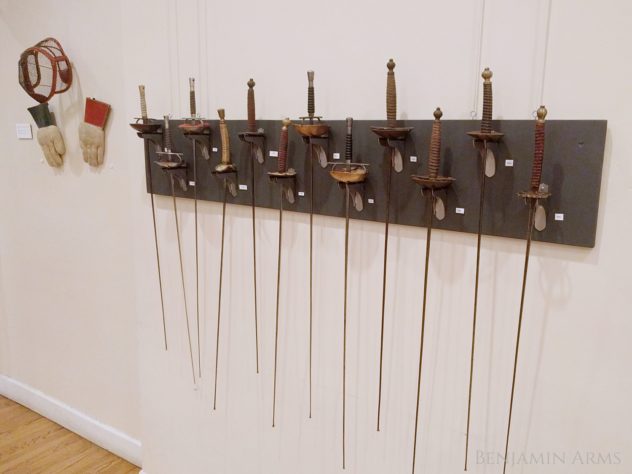 Antique fencing swords in museum exhibition at La Nacional in New York City