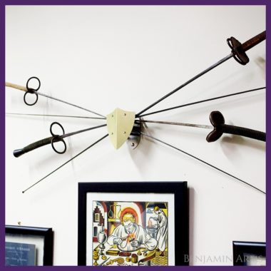 Crossed fencing swords wall mount with four french foils